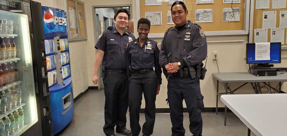 three police officers smiling